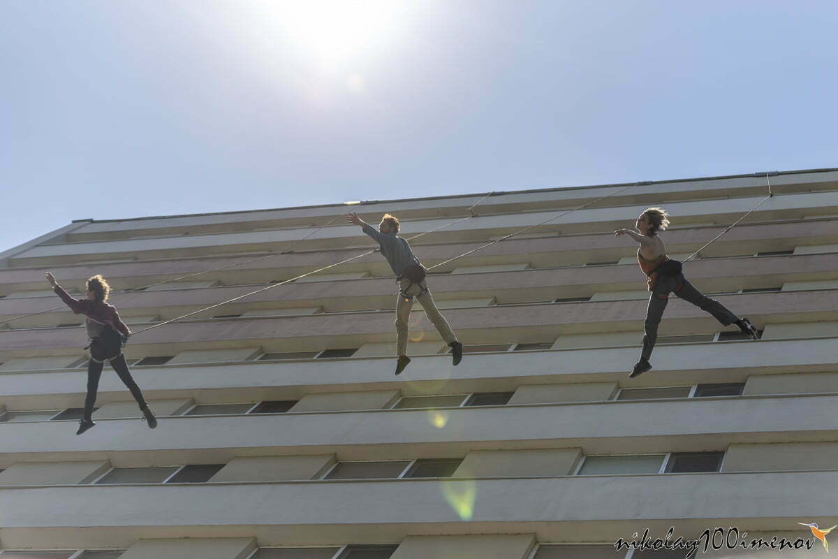 PLOVDIV, BULGARIA - JUNE 16, 2019 - Artists performing a dance show with ropes on the side of a building in Plovdiv city in Bulgaria